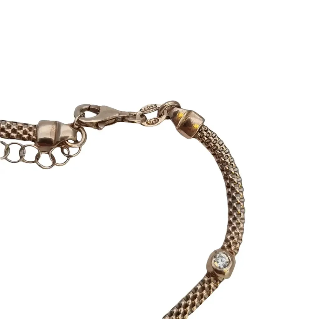 Vintage bracelet for women in golden silver and zircons.