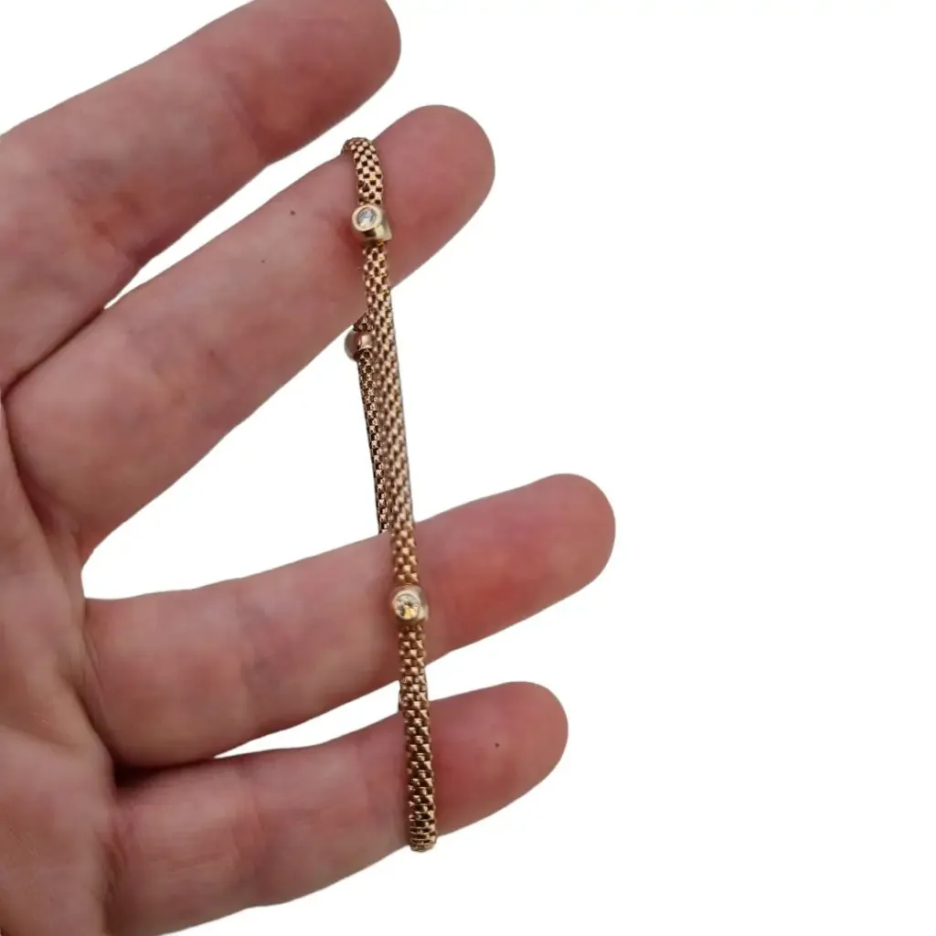 Vintage bracelet for women in golden silver and zircons.