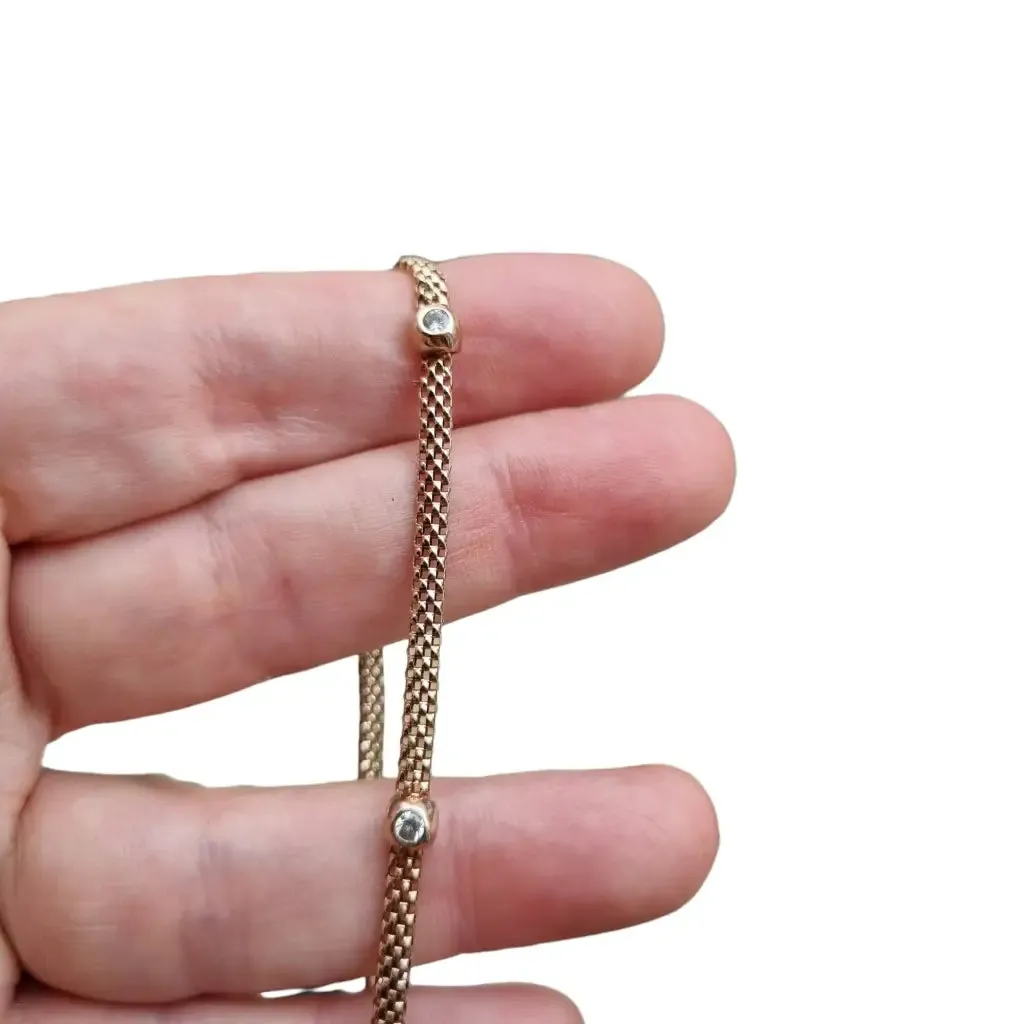 Vintage bracelet for women in golden silver and zircons.
